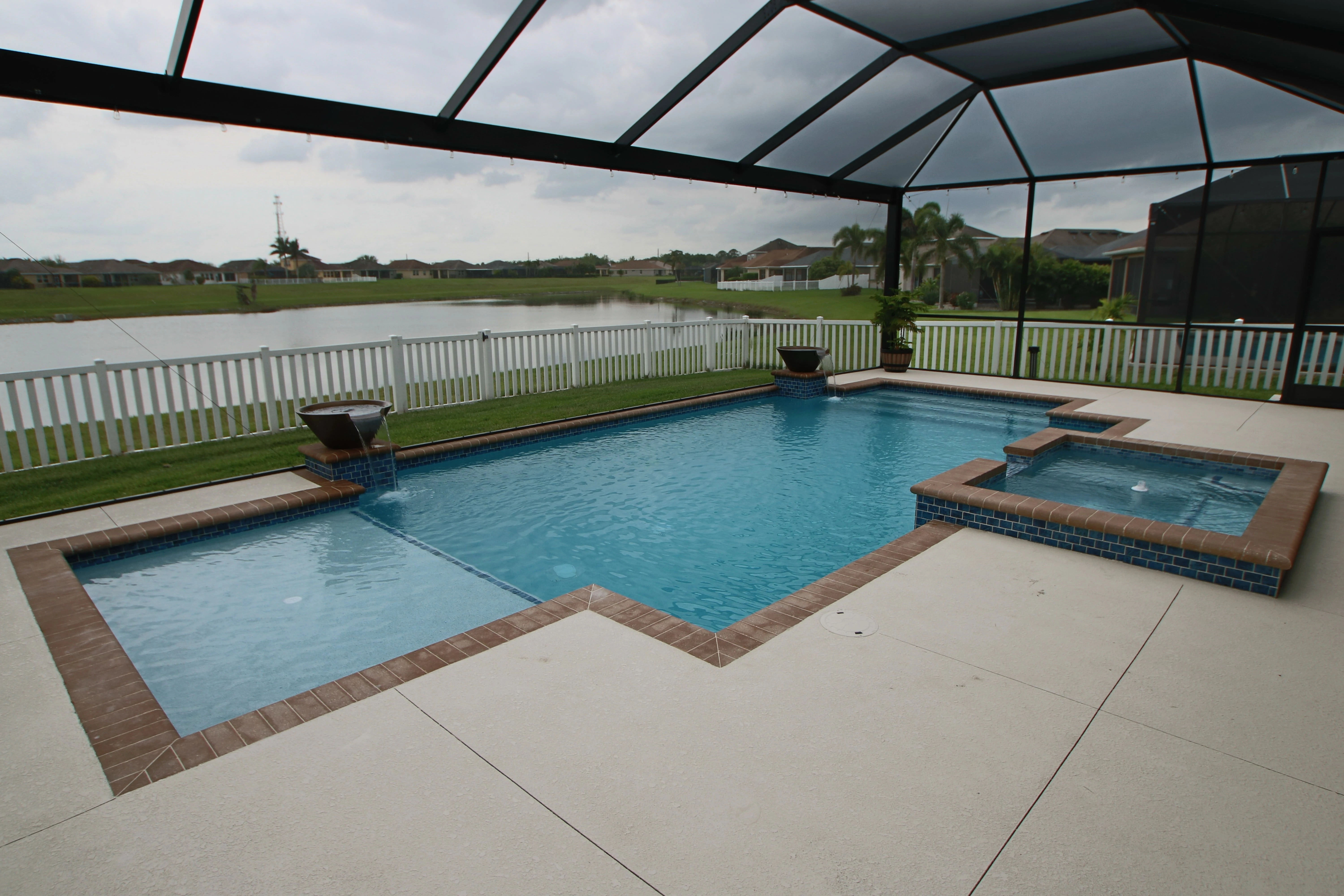 Features: Tan coping, concrete pool deck, Light Royal Blue Pebblestone interior finish.